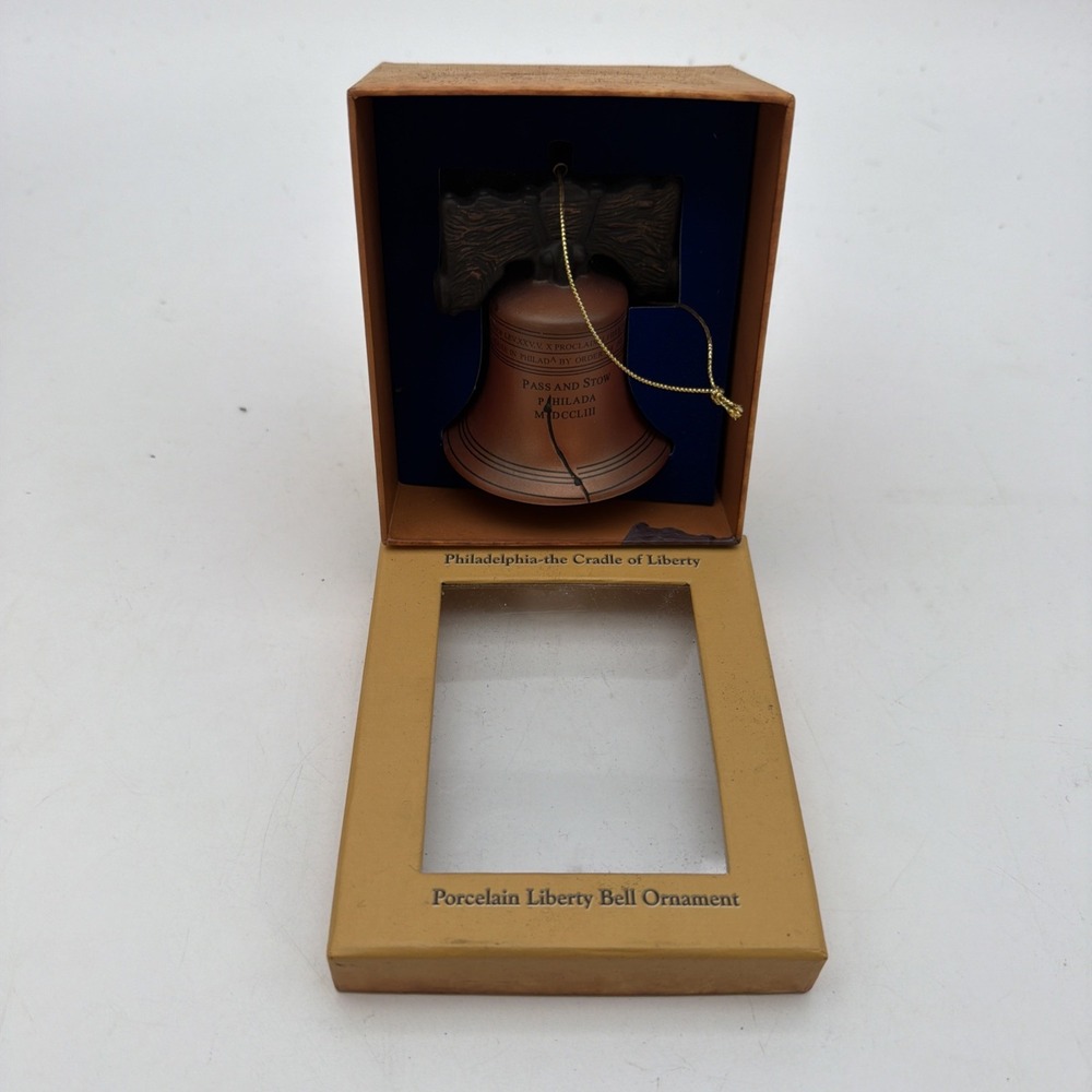 porcelain Liberty Bell ornament inside a presentation box labeled